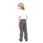 A child wearing Eco Outfitters GOTS organic cotton school uniform trousers - boys slim fit in grey, with a white polo shirt and black shoes, back to camera but peering over shoulder. White background