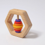 Grimm's Wooden Hexagon Baby Rattle on a grey background