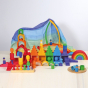Grimm's Wooden Medium Rainbow with a rainbow village created with other Grimm's toys