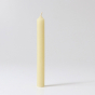 A single Cream 100% beeswax candle by Grimm's. White background.