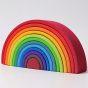 Grimm's 12 piece wooden rainbow. 12 arch shaped pieces each one painted in different colours.