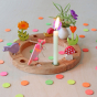 Grimm's Sweet Cone Decorative Figure - Neon Pink. The cone sits in a Grimm's celebration ring and is surrounded by Grimm's Confetti.