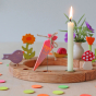 Grimm's Sweet Cone Decorative Figure - Neon Pink. The cone sits in a Grimm's celebration ring and is surrounded by Grimm's Confetti.