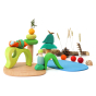 Grimm's wooden Waldorf small world play toy set laid out on a white background with some shells, pinecones and leaves