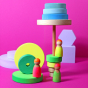 Grimm's 3 Friends Wooden Peg People in a Neon Mix of colours in pink, orange yellow and green displayed with the Neon Green Conical Stacking Tower with a bright pink background.
