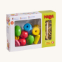 HABA Wooden Threading Game - Bambini Beads box, showing the colourful beads inside along with the yellow cord, on a cream background