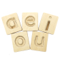 Hellion Toys eco-friendly wooden vowel blocks laid out in 2 rows on a white background