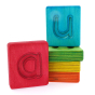 Hellion Toys plastic-free wooden rainbow vowel cubes stacked up on a white background