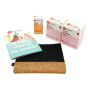 Hey Girls my first period kit with black cork bag laid out on a white background