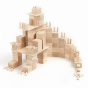 Just blocks childrens plastic free wooden stacking shapes stacked into a dragon shape on a white background