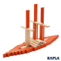 Kapla plastic-free wooden building shapes stacked into a boat construction on a white background