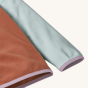 A close up of the cuffs and arms of a Patagonia Kids Micro D Fleece Jacket
