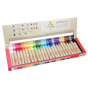 Kitpas 24 coloured rice bran wax crayons in their open box on a white background