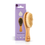 Kokoso natural wooden baby hairbrush on a white background next to its cardboard box