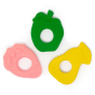 Three natural rubber baby teething toys, a yellow pear, green apple and pink strawberry on a white background.