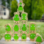 Lanka Kade plastic-free wooden feelings folk figures stacked in a pyramid on a wooden bench