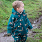 A young child wears the LGR Around The Campfire Sherpa Fleece Snowsuit in an outdoor setting.