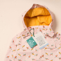 Close up of the LGR eco-friendly recycled plastic origami birds rain coat showing the yellow hood on a white background