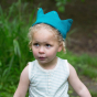 Close up of child wearing an LGR striped kids vest and blue knitted crown