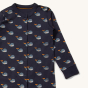Close up of the front of the Little Green Radicals Adaptive Whale Song Sleepsuit showing the popper button closure