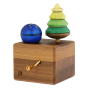 Mader Kreiselmanufaktur Luna Music Box, plays a melody of LaLeLu. A beautiful hand crafted music box from Mader has one Fir tree, and one starry night spinning top sitting in a square walnut base, on a cream background