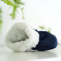 Mamalila thermal baby allrounder thermal bootie laying on a white table showing the fluffy inside
