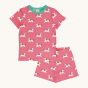 Maxomorra Children's Organic Cotton Unicorn Short Sleeve Pyjama Set. A vibrant pink fabric, with fun unicorn print and light green trim on the collar of the pyjama top