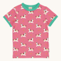 Maxomorra Children's Organic Cotton Unicorn Short Sleeve Top. A vibrant pink t-short with fun unicorn print and a light green trim on the collar and sleeves