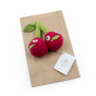 Myum cherry sisters fairtrade soft toys on their brown paper bag on a white background