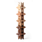 Naef spiel natural wooden stacking toy blocks stacked in a tall tower on a white background