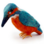 A closer look at the details on The Makerss Needle Felt Kingfisher. A beautifully crafted Kingfisher with an orange belly, black beak and blue and white plumage, stood on a white background