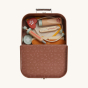 
The Olli Ella Dinkum Dog Vet Set is a brown Vet's bag containing a toy stethoscope, thermometer, plasters, syringe, cream tube, dog cone, and Vet's notes.   
