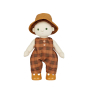 Olli ella dinkum doll stood on a white background wearing the apricot travel tog outfit 