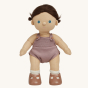 Olli Ella Bitsy poseable, soft bodied Dinkum Doll with hair tied up in little bunches at the side of their head standing up pictured on a plain coloured background 