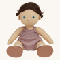 Olli Ella Bitsy poseable, soft bodied Dinkum Doll with hair tied up in little bunches at the side of their head sitting down pictured on a plain coloured background 