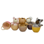 Olli Ella Small Blossom Baskets pictured together in all colours with Wild cozy dinkums in them 