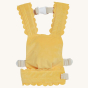 Olli Ella Dinkum Dolls Petal Carrier - Buttercup. A snuggly plush velvet yellow doll carrier, on a cream background