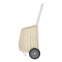 Side of the childrens eco-friendly Olli Ella woven rattan luggy in the chalk colour on a white background