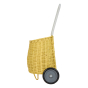 Side of the Olli Ella childrens natural rattan wheeled luggy basket in the lemon colour on a white background