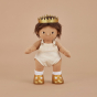 Olli ella dinkum doll stood on a beige background wearing the gold sparkle crown and shoes accessory toy set