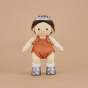 Olli ella dinkum doll stood on a beige background wearing the sparkles accessory set in silver