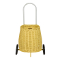 Front of the Olli Ella childrens natural rattan wheeled luggy basket in the lemon colour on a white background
