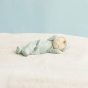 Olli Ella childrens eco-friendly dozy dinkum doll in the boat print laying on a white blanket