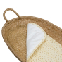 Olli Ella cream luxe basket liner, inside a woven rattan basket, with the corner folded over showing the white underside 
