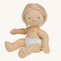 Olli Ella Petal poseable, soft bodied, Dinkum Doll with no romper on, wearing a white nappy siting down pictured on a plain coloured background 