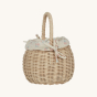 A side view of the Olli Ella Rattan Berry Basket with Lining – Pansy Floral. A beautifully woven rattan basket with cream cotton lining with a vintage pansy floral pattern, on a cream background