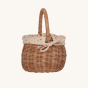 A side view of the Olli Ella Rattan Berry Basket with Lining – Gumdrop. A beautiful lined rattan basket, with gumdrop print on a cream background