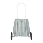 Back of the Olli Ella hand woven rattan basket trolley in the vintage blue colour on a white background