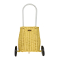 Back of the Olli Ella childrens natural rattan wheeled luggy basket in the lemon colour on a white background