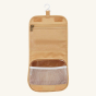 Olli Ella See-Ya wash bag in a butterscotch yellow colour shown open pictured on a plain background